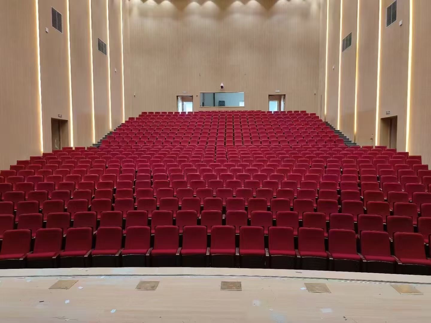 Auditorium chair row installation in lecture hall