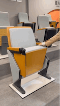 Damping return mechanism slow reset on auditorium chair
